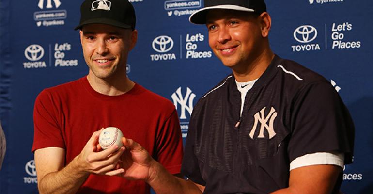 Zach Hample and Alex Rodriguez with the ball he hit for his 3000 career hit  Copyright Mike Stobe Getty Images