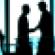 businessmen handshake silhouetted business transition partner