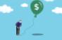 businessman pumping up balloon financial advisors