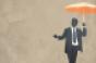 businessman holding umbrella illustration