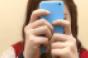 teenager-phone-face-covered.jpg