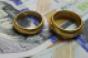 wedding-rings-separate-dollars.jpg